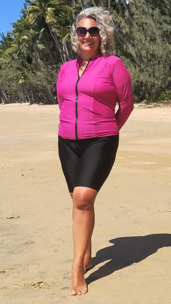 pink rash shirt with front zip and black swim leggings