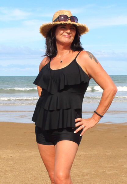 boyleg swim shorts and frilly tankini top