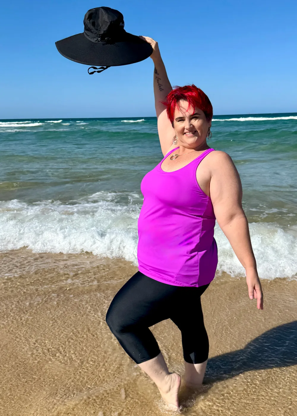bright pink loose fit tankini with supportive inner bra