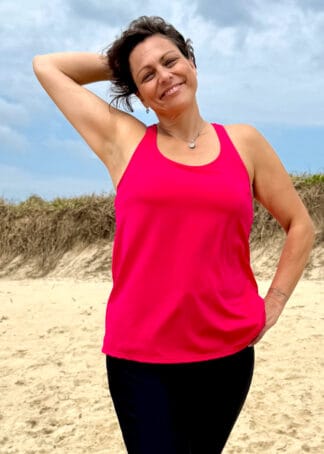 Loose fitting swim top in red showing the relaxed non cling