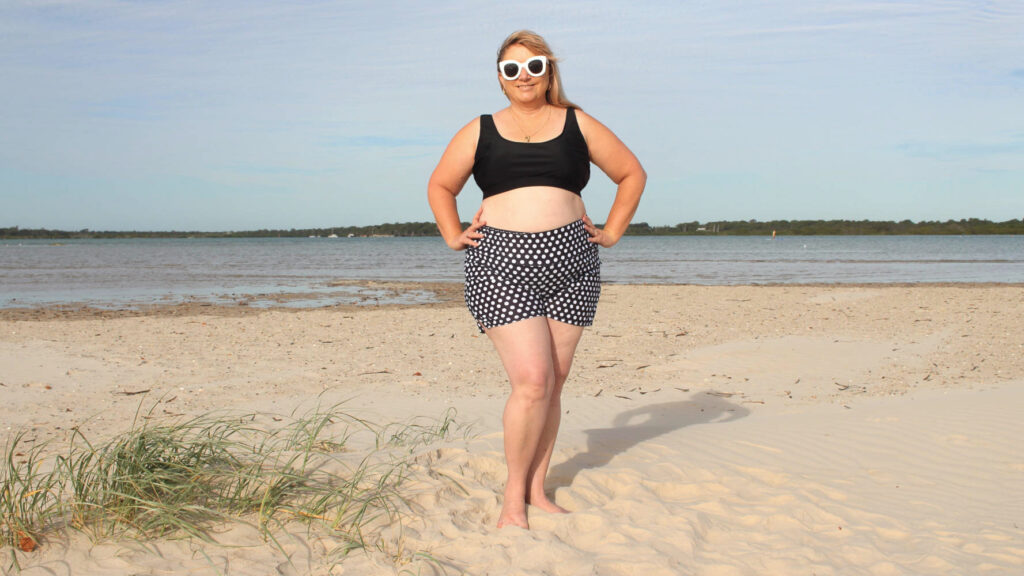 curvy-women-wearing-polka-dot-swim-shorts-bikini-ocean-road-swimwear-meet-the-models