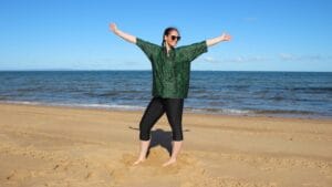 women wearing animal print swim shirt baggy sun protection beach wear for plus size women BANNER_1098