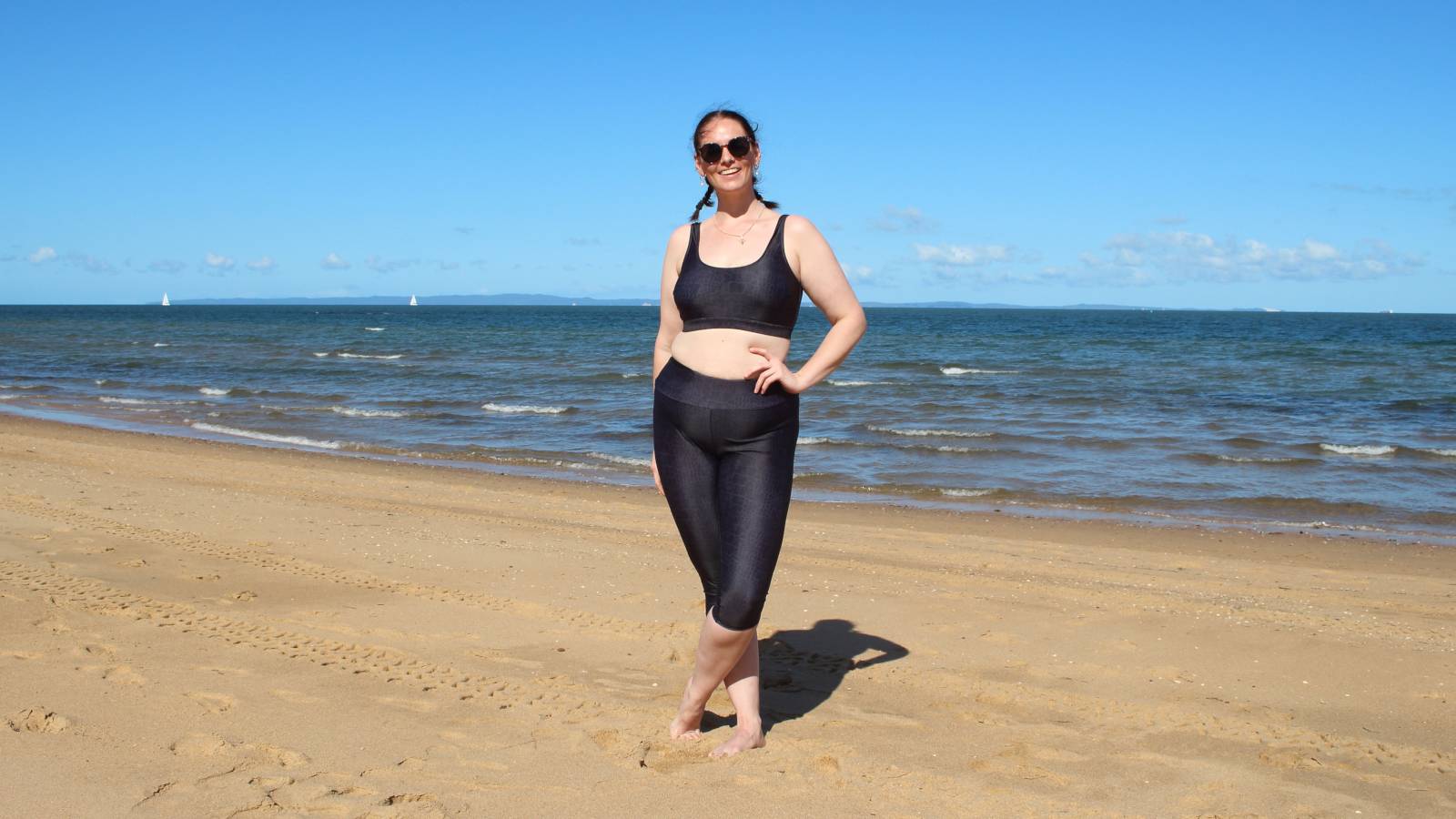 women wearing swim leggings and crop swim top cami on beach brisbane australia BANNER_1003aB