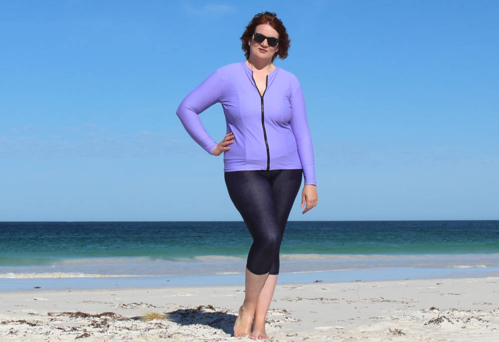 women wearing swimsafe swimwear uv protection walking on beaches in wa australia Banner