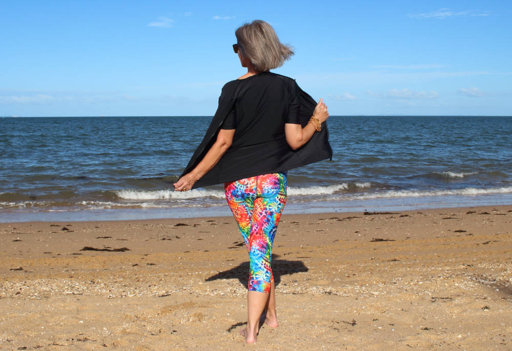 BANNER woman wearing swimwear undressing