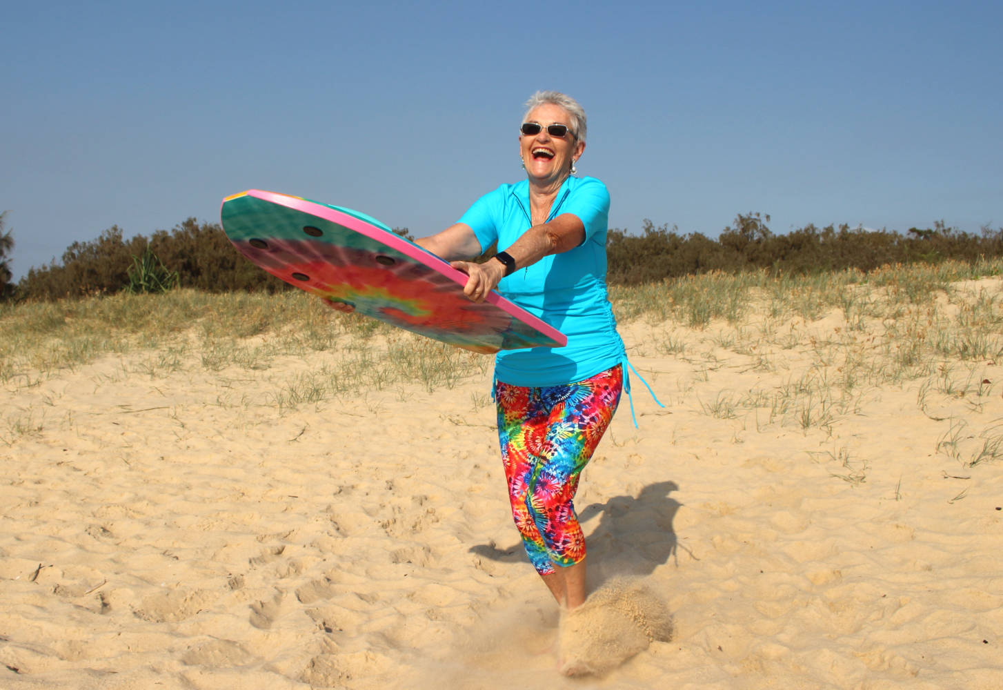 mature women surfing bodyboarding in australia