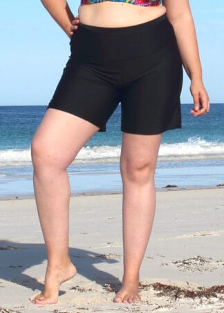Women wearing Plus Size Black Baggy Swim Shorts above the knee