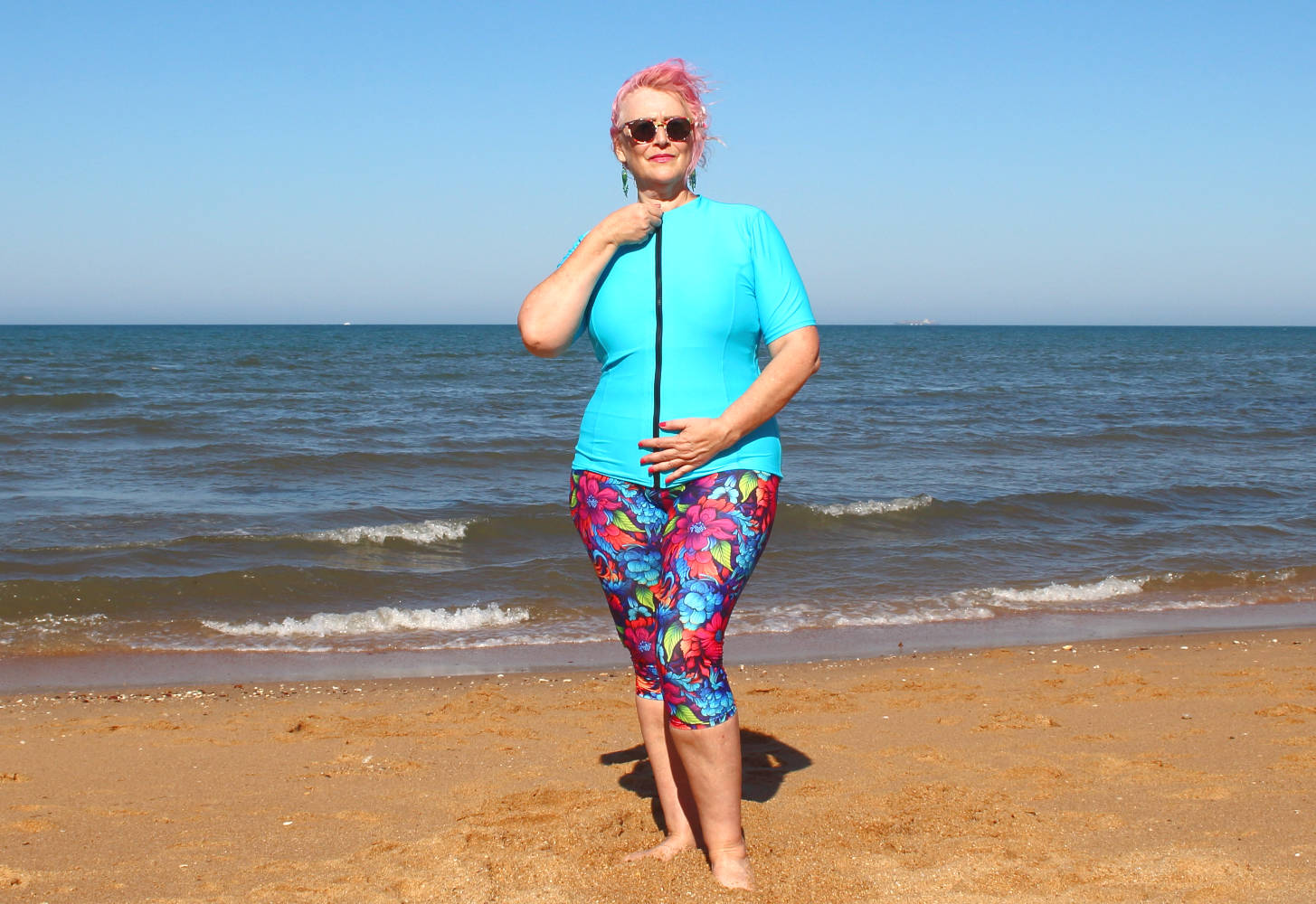 women wearing plus size sun safe swimwear on beach Australia banner