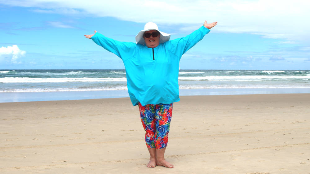 plus size women wearing sun protective swimwear