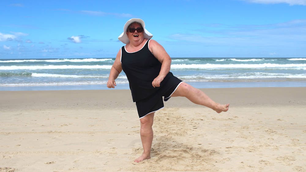 body confidence real women wearing swimsuit tankini and swim shorts plus size