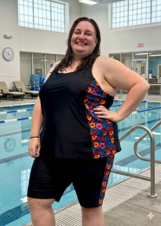 Plus Size Women wearing Knee Length Swim Shorts Chlorine Resistant with Waist Tie and fabric design on side of leg