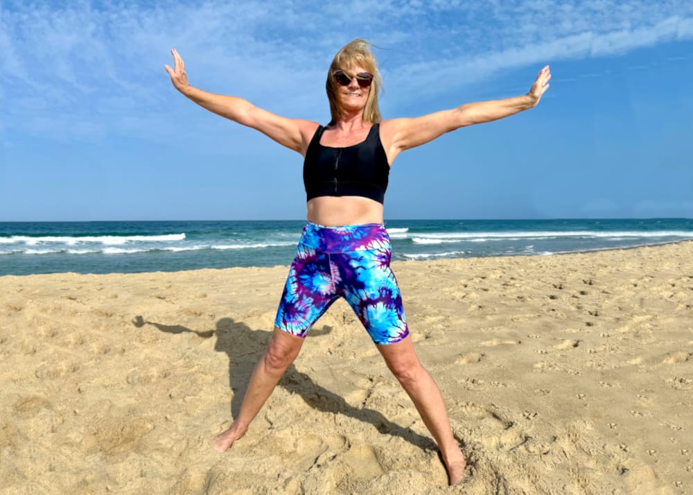 women empowerment women over 50 on beach wearing ocean road swimwear an australian brand for mature women - banner