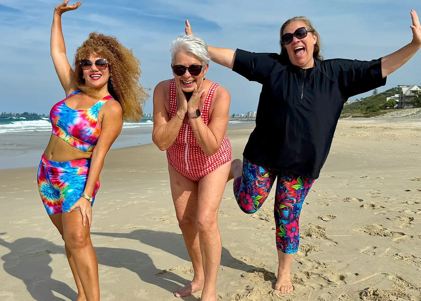 women wearing oceanroad swimwear on a beach having fun and looking very happy