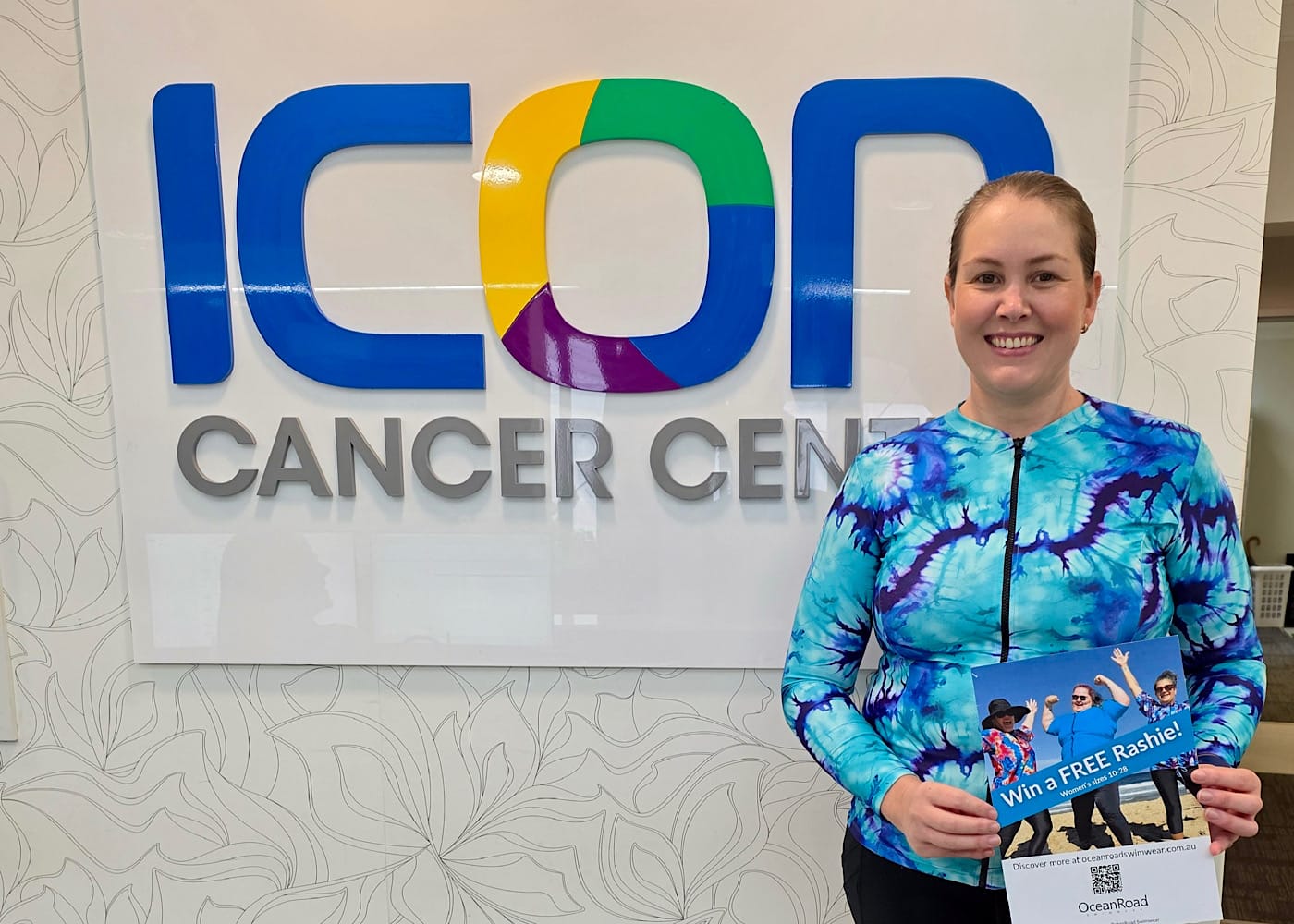 ICON Cancer Center Image of Nurse in Collaboration with OceanRoad Swimwear Sun Safe Rashie Donation Townsville