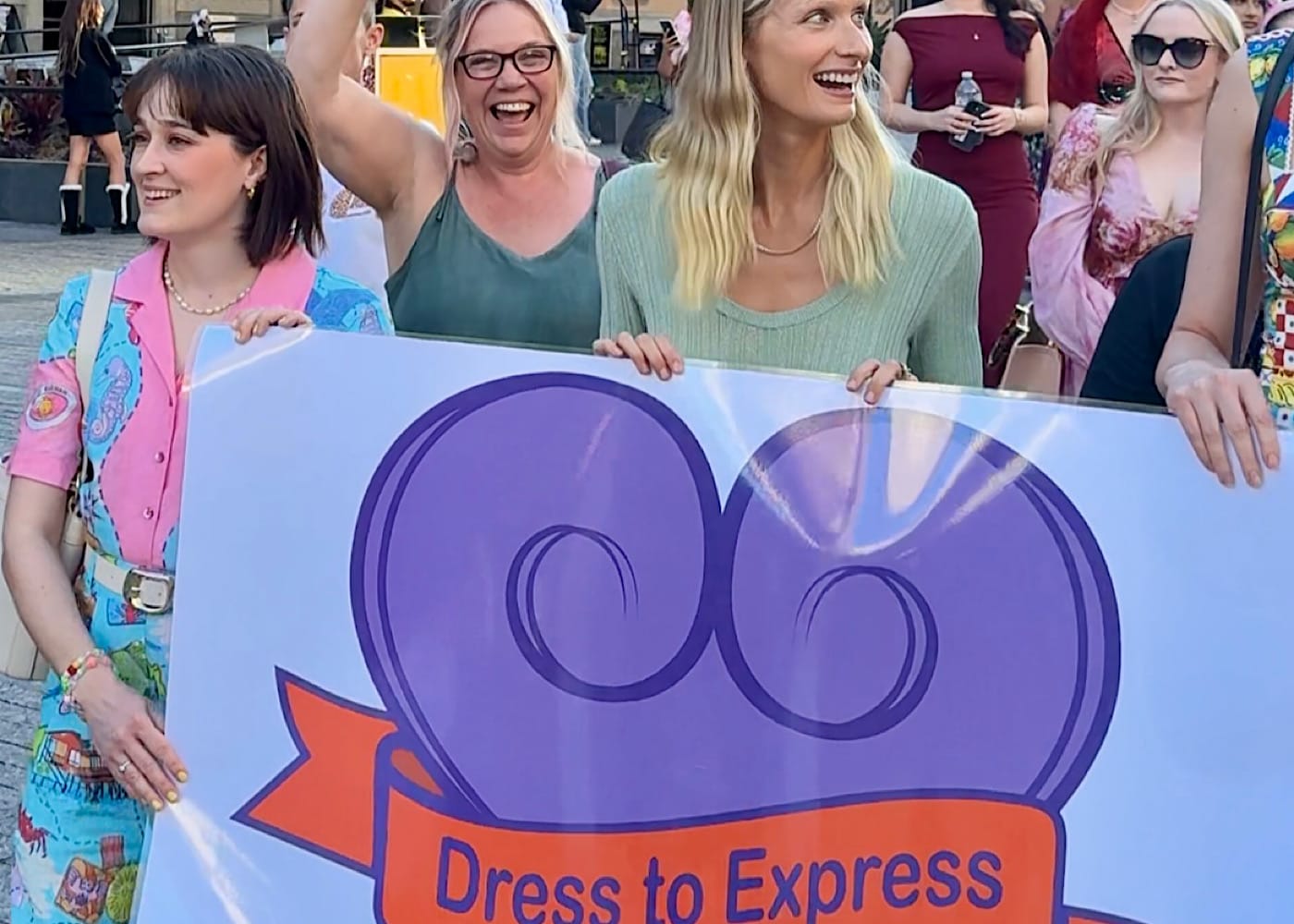 OceanRoad swimwear marching with dress to Express March against domestic violence